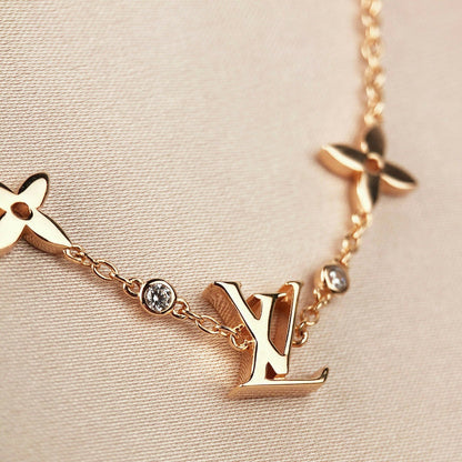 [Max Jewelry ]STAR AND SUN 7 MOTIFS GOLD BRACELET