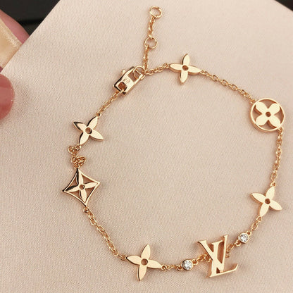 [Max Jewelry ]STAR AND SUN 7 MOTIFS GOLD BRACELET