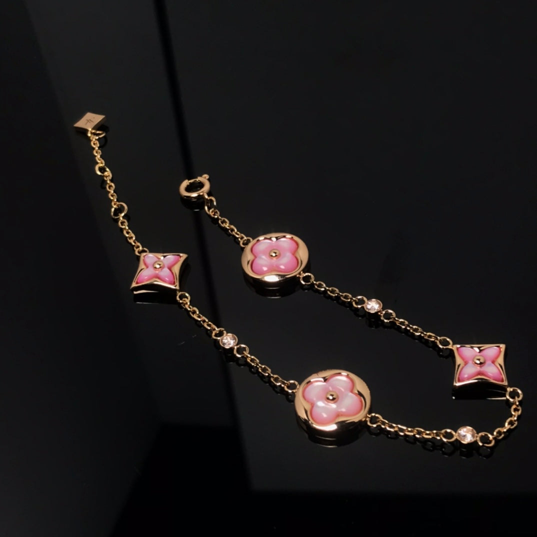 [Max Jewelry ]STAR AND SUN 4 MOTIF PINK MOP PINK GOLD BRACELET