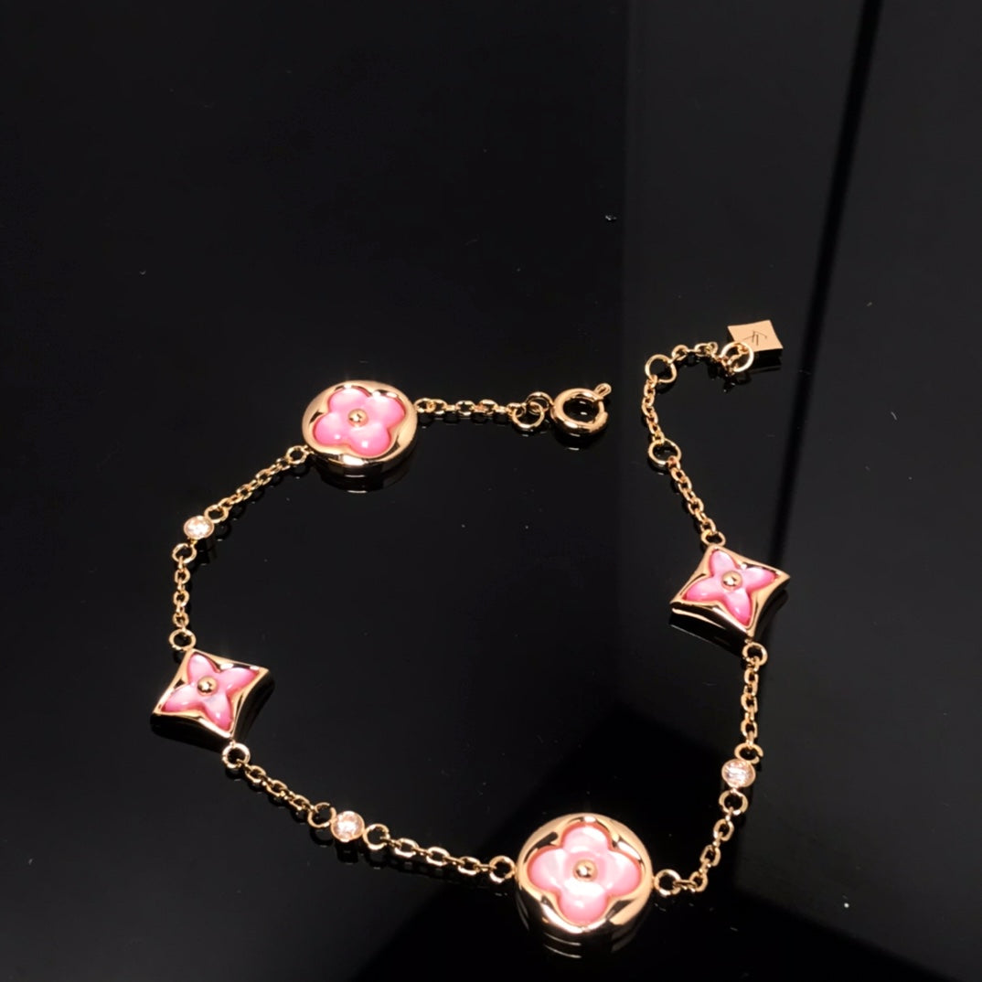 [Max Jewelry ]STAR AND SUN 4 MOTIF PINK MOP PINK GOLD BRACELET