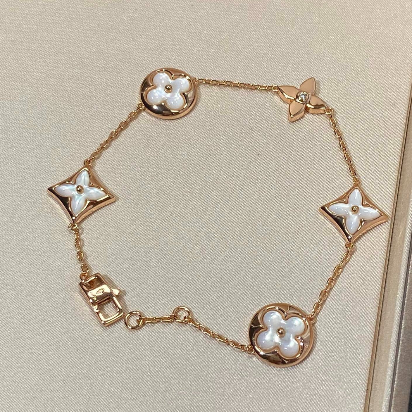 [Max Jewelry ]STAR AND SUN 5 MOTIF MOP PINK GOLD BRACELET
