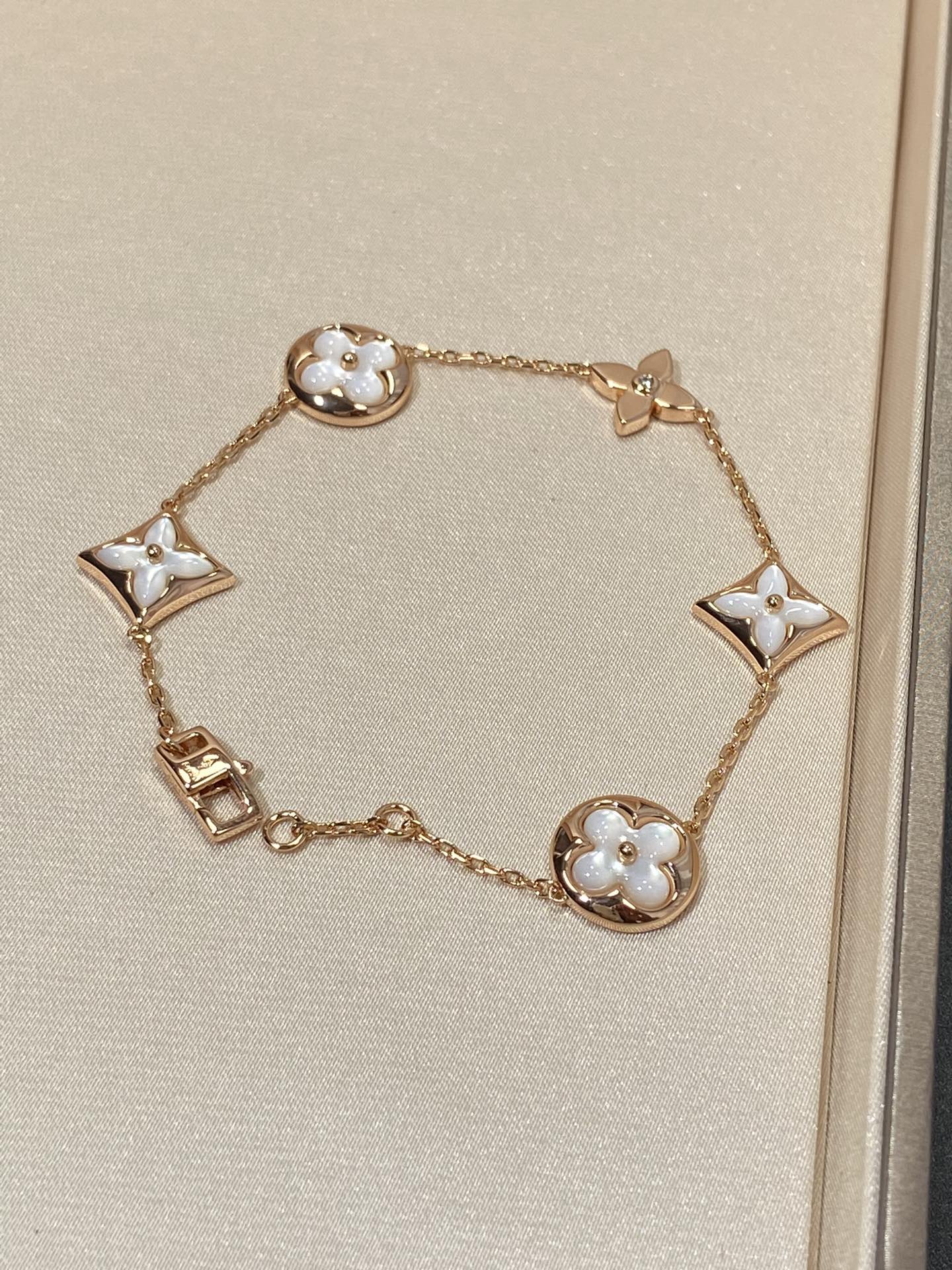 [Max Jewelry ]STAR AND SUN 5 MOTIF MOP PINK GOLD BRACELET