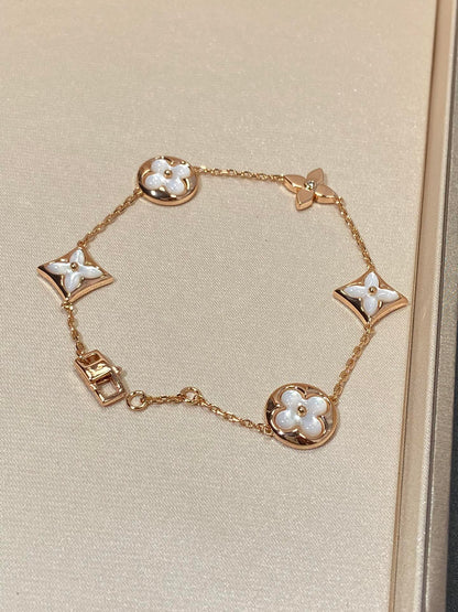 [Max Jewelry ]STAR AND SUN 5 MOTIF MOP PINK GOLD BRACELET