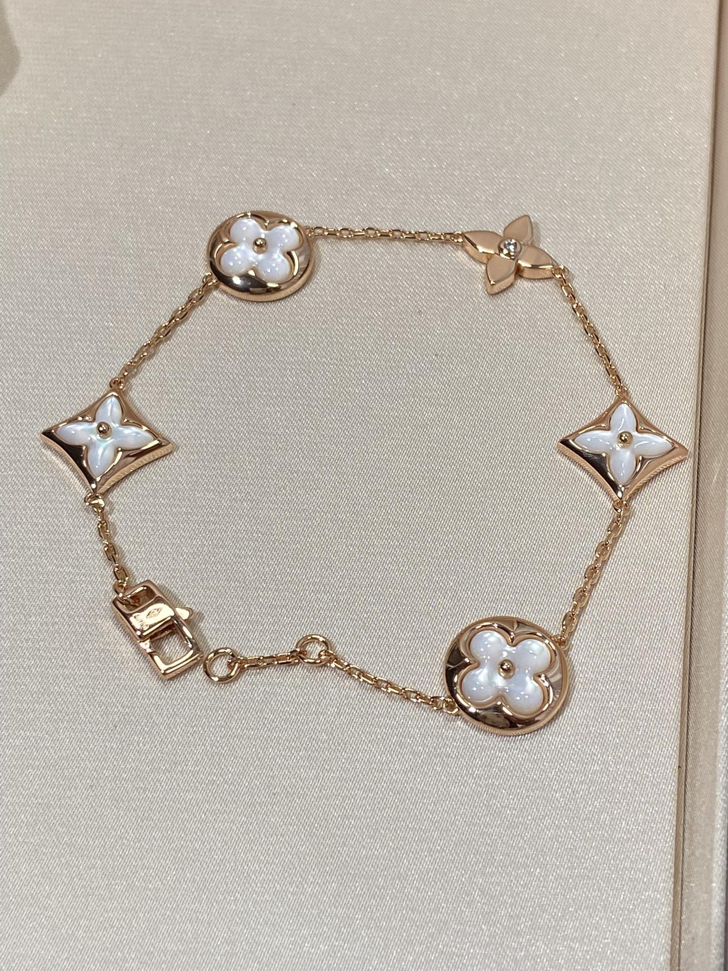 [Max Jewelry ]STAR AND SUN 5 MOTIF MOP PINK GOLD BRACELET