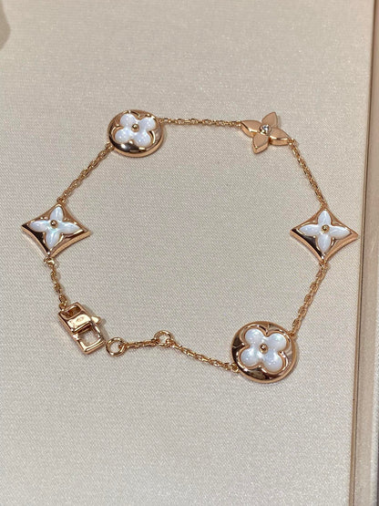 [Max Jewelry ]STAR AND SUN 5 MOTIF MOP PINK GOLD BRACELET