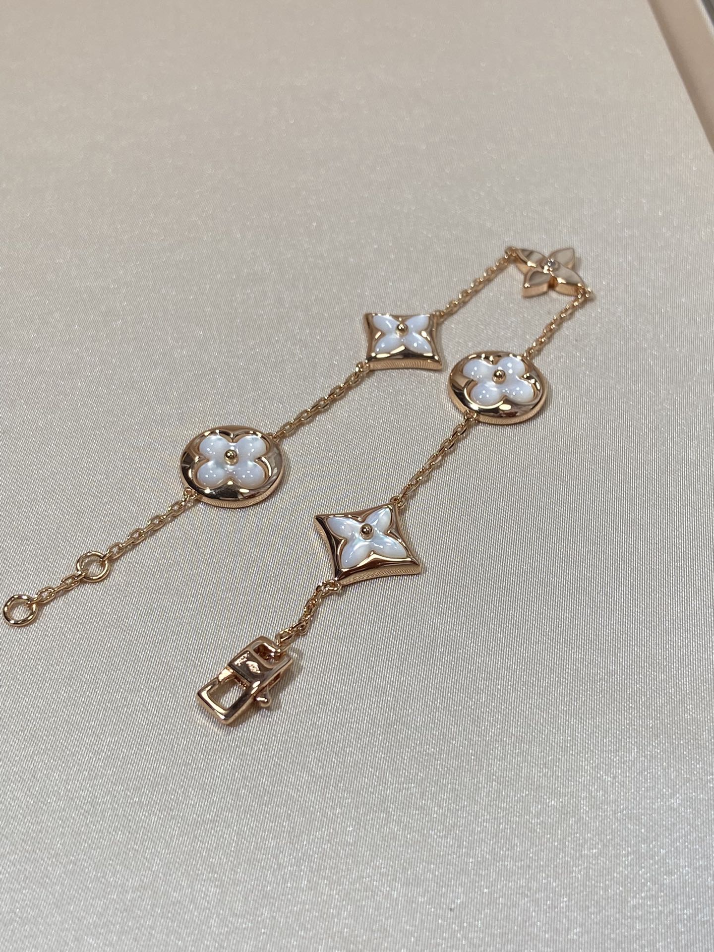 [Max Jewelry ]STAR AND SUN 5 MOTIF MOP PINK GOLD BRACELET
