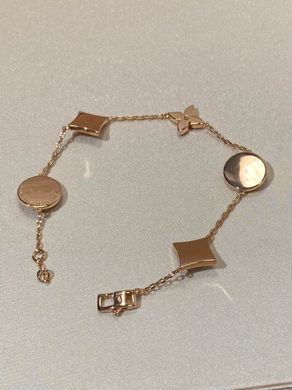 [Max Jewelry ]STAR AND SUN 5 MOTIF MOP PINK GOLD BRACELET