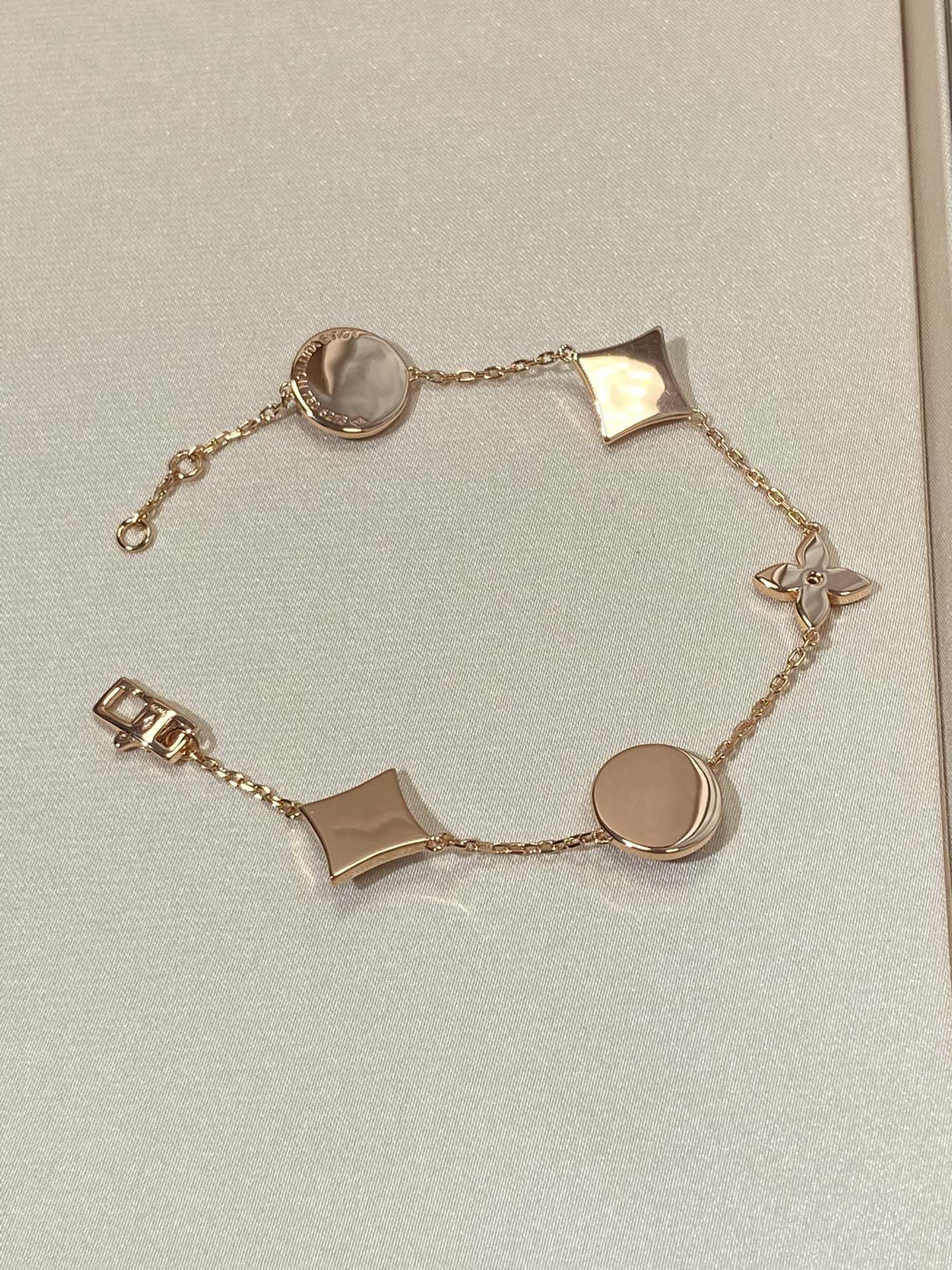 [Max Jewelry ]STAR AND SUN 5 MOTIF MOP PINK GOLD BRACELET