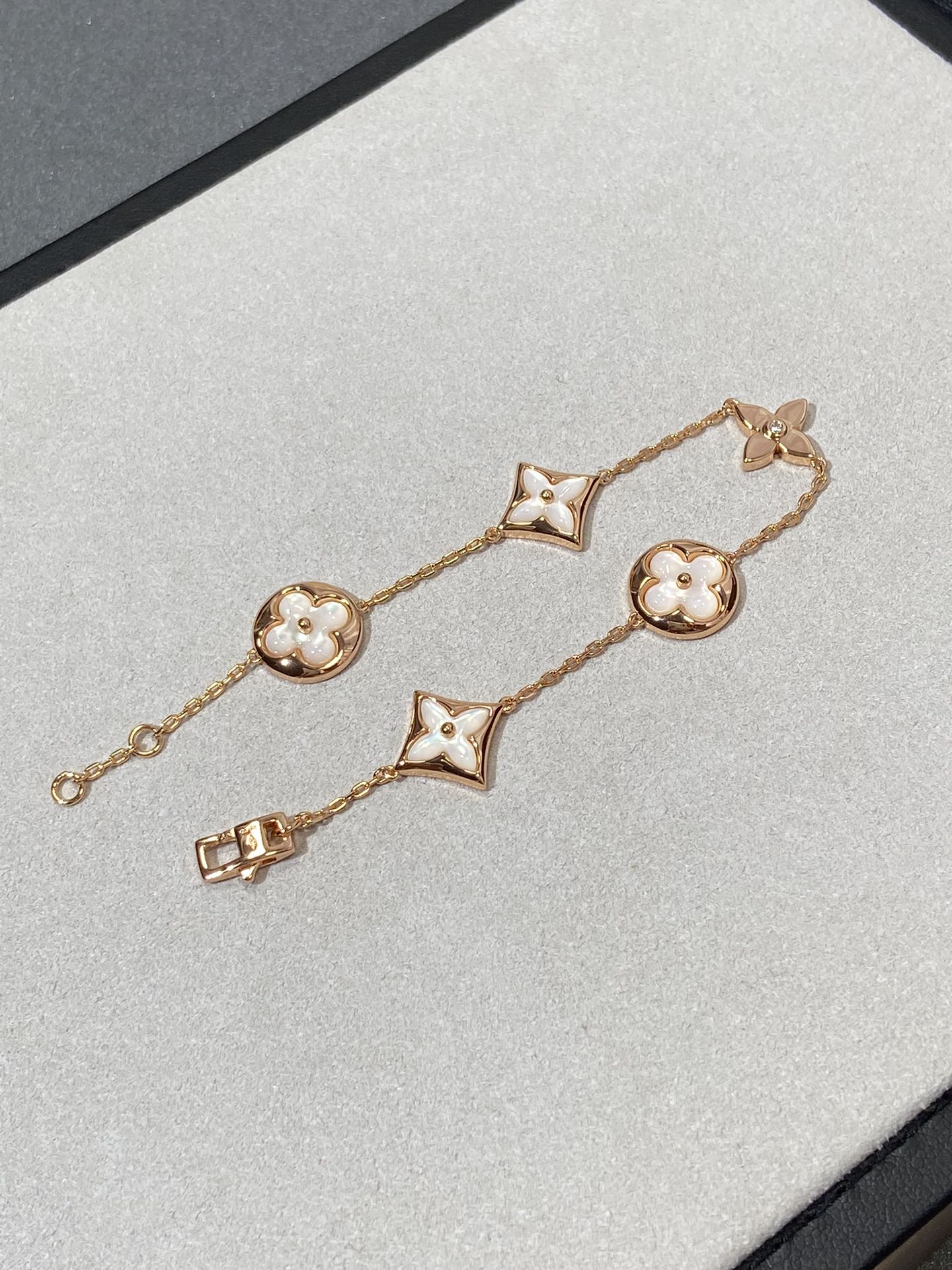 [Max Jewelry ]STAR AND SUN 5 MOTIF MOP PINK GOLD BRACELET