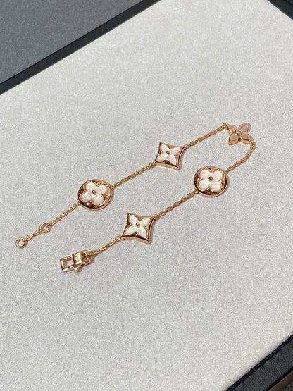 [Max Jewelry ]STAR AND SUN 5 MOTIF MOP PINK GOLD BRACELET