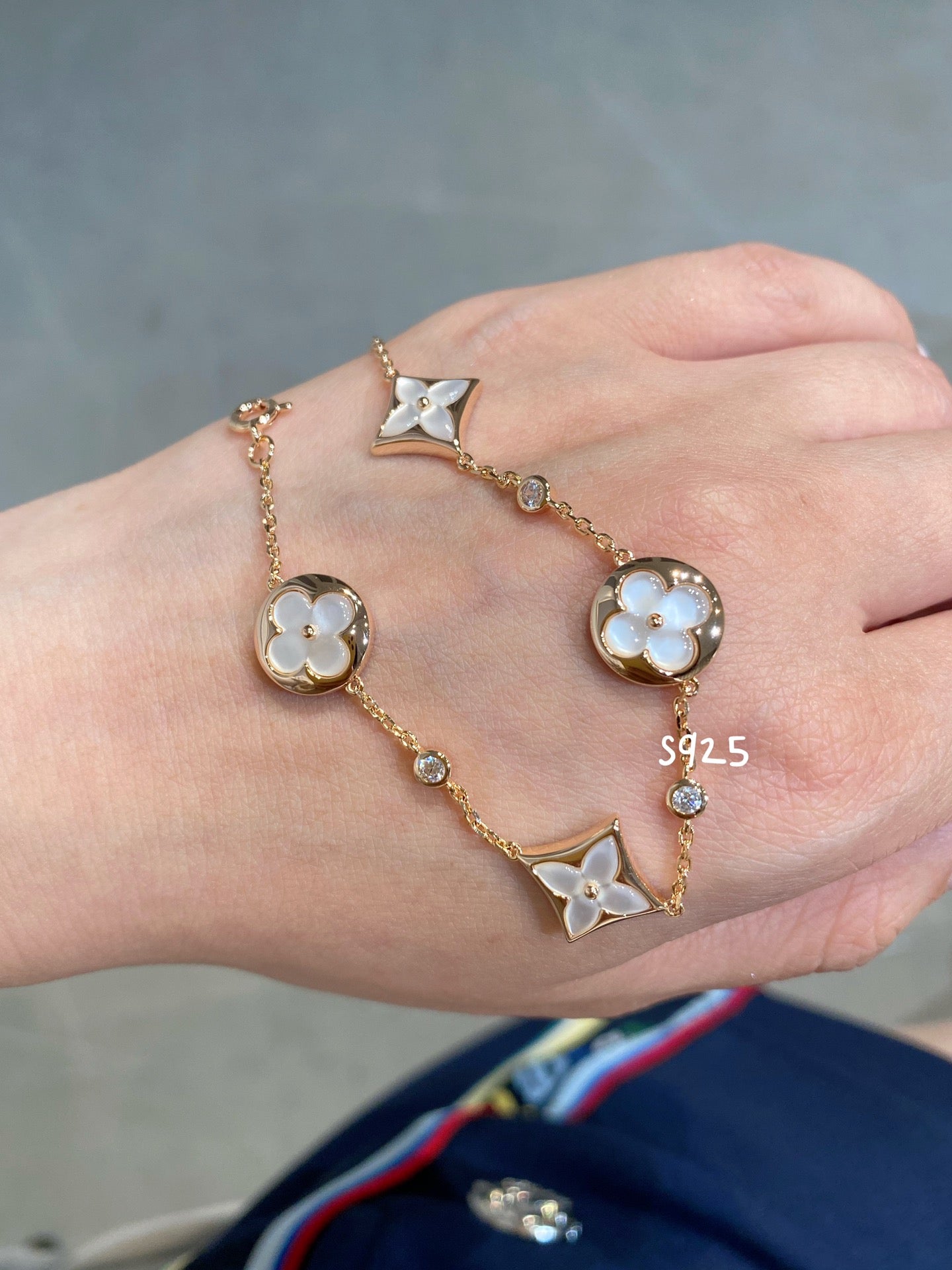 [Max Jewelry ]STAR AND SUN 4 MOTIF WHITE MOP PINK GOLD BRACELET