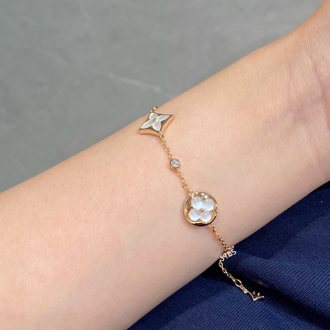 [Max Jewelry ]STAR AND SUN 4 MOTIF WHITE MOP PINK GOLD BRACELET