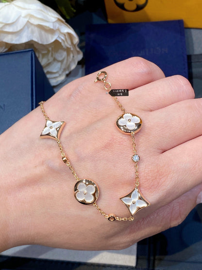 [Max Jewelry ]STAR AND SUN 4 MOTIF WHITE MOP PINK GOLD BRACELET