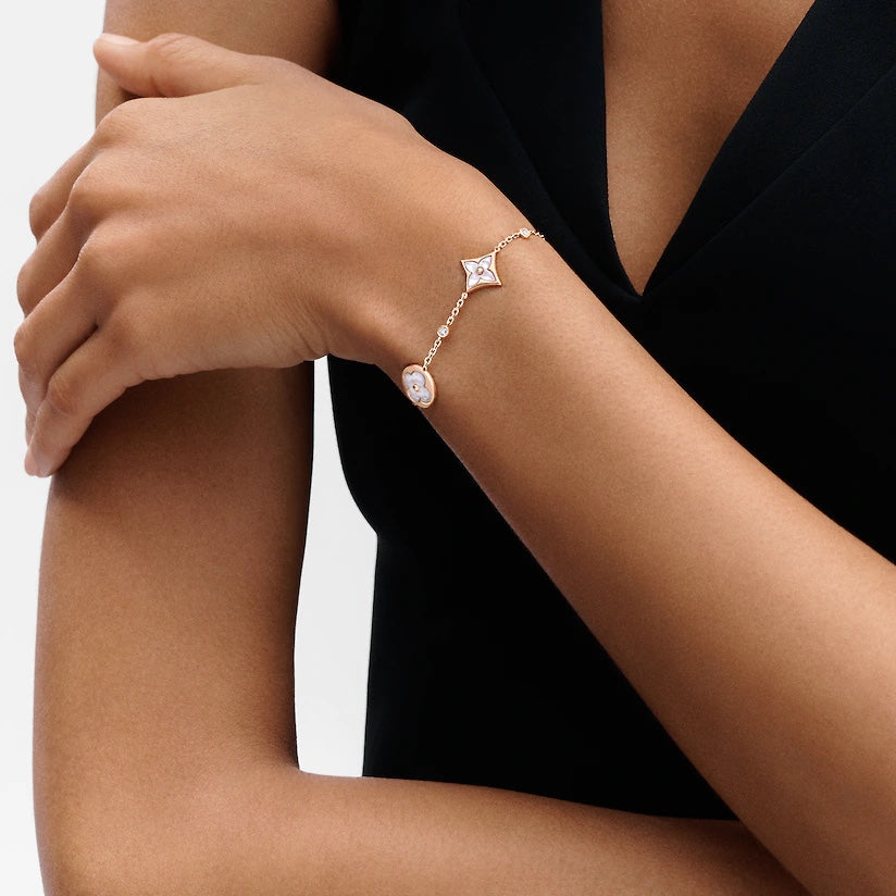 [Max Jewelry ]STAR AND SUN 4 MOTIF WHITE MOP PINK GOLD BRACELET