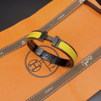 [Max Jewelry ]CLIC HM SO BLACK YELLOW BRACELET