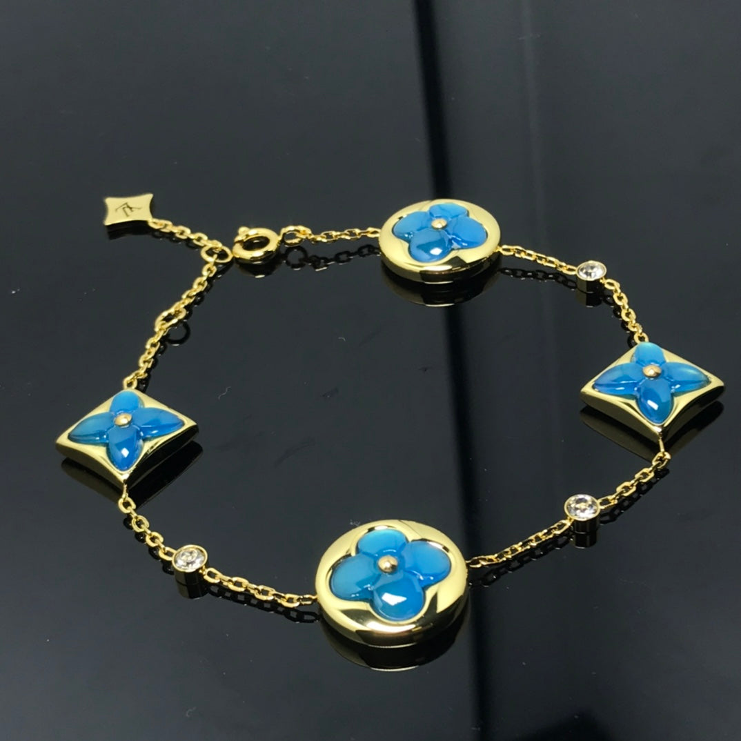[Max Jewelry ]STAR AND SUN 4 MOTIF BLUE BRACELET
